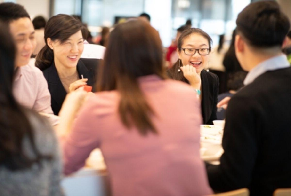 A group of people having a meeting